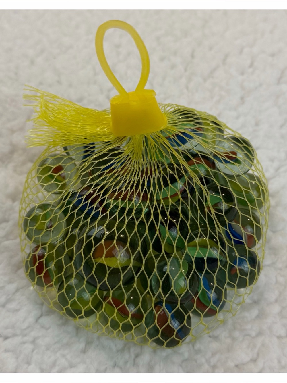 (VTG) Yellow Mesh Bag of Multicolor Swirl Cat's-Eye Glass Marbles, OS
